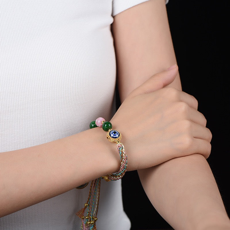 Tibetan Wealth Blessing Bracelet – Handmade Incense-Infused Glass & Thangka Charm