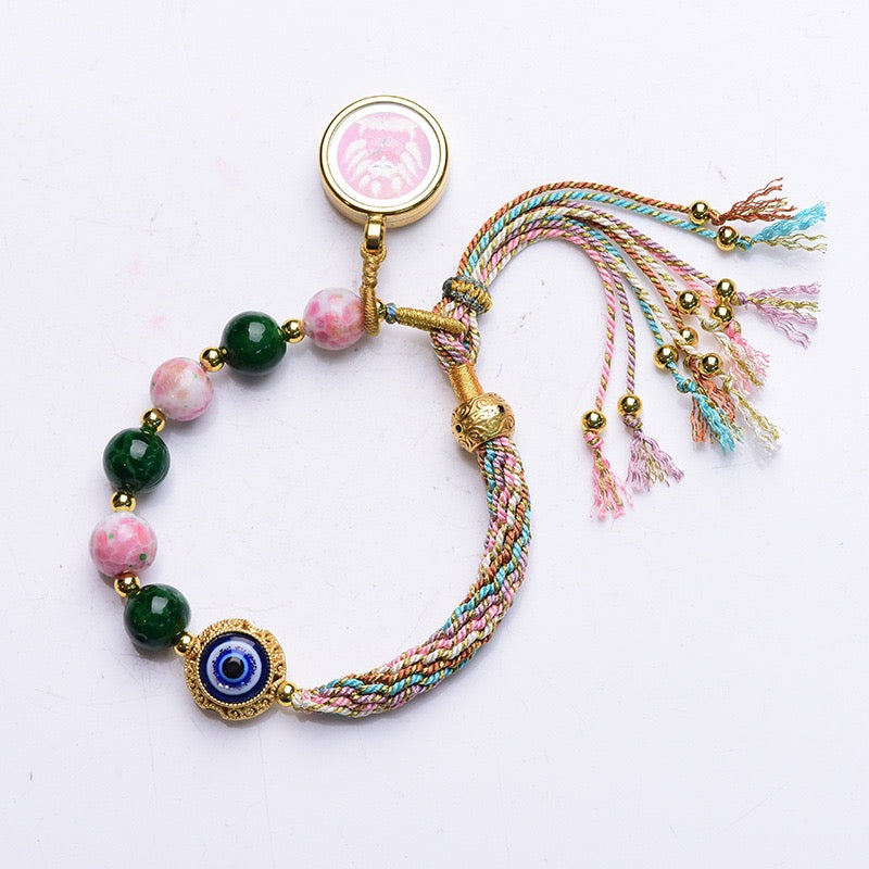 Tibetan Wealth Blessing Bracelet – Handmade Incense-Infused Glass & Thangka Charm