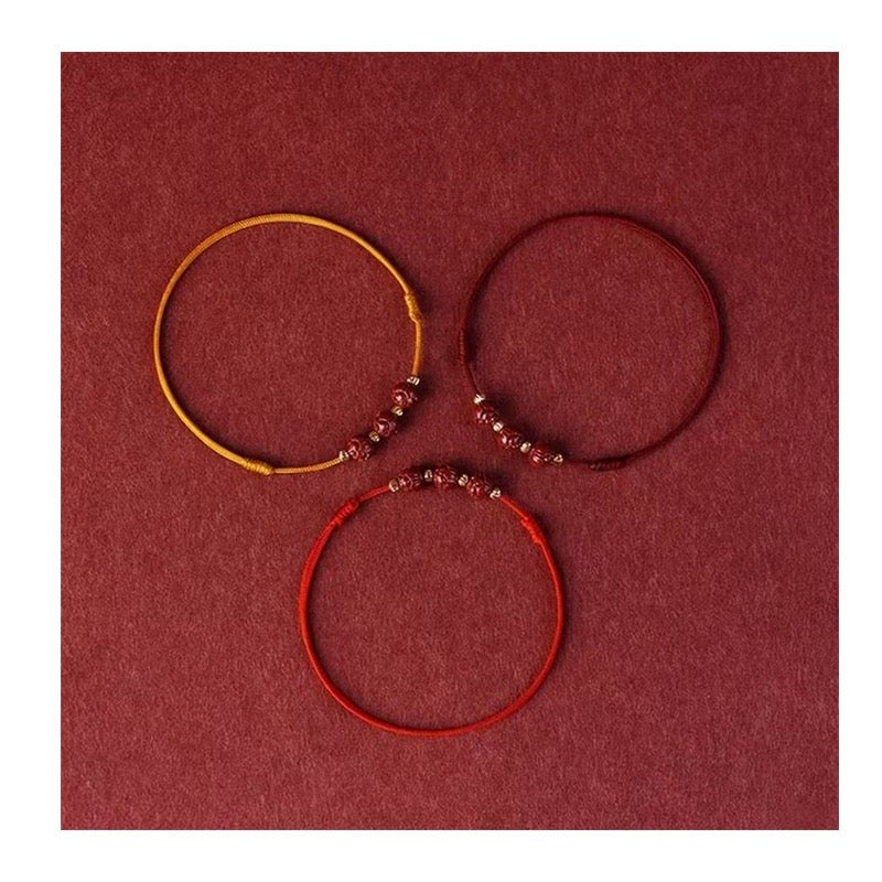 "Lotus Steps" ā Handwoven Cinnabar Blessing Anklet