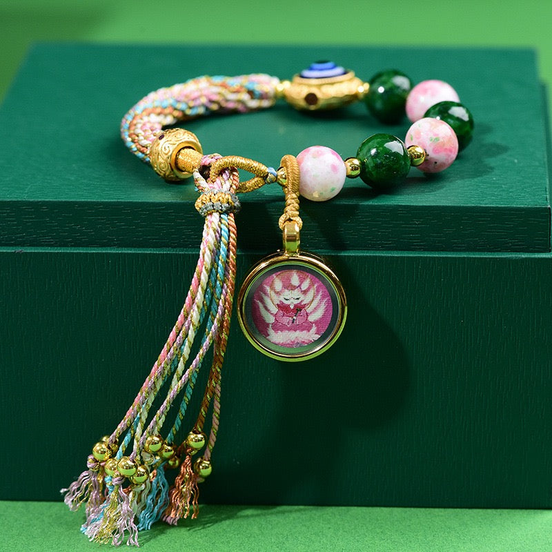 Tibetan Wealth Blessing Bracelet – Handmade Incense-Infused Glass & Thangka Charm