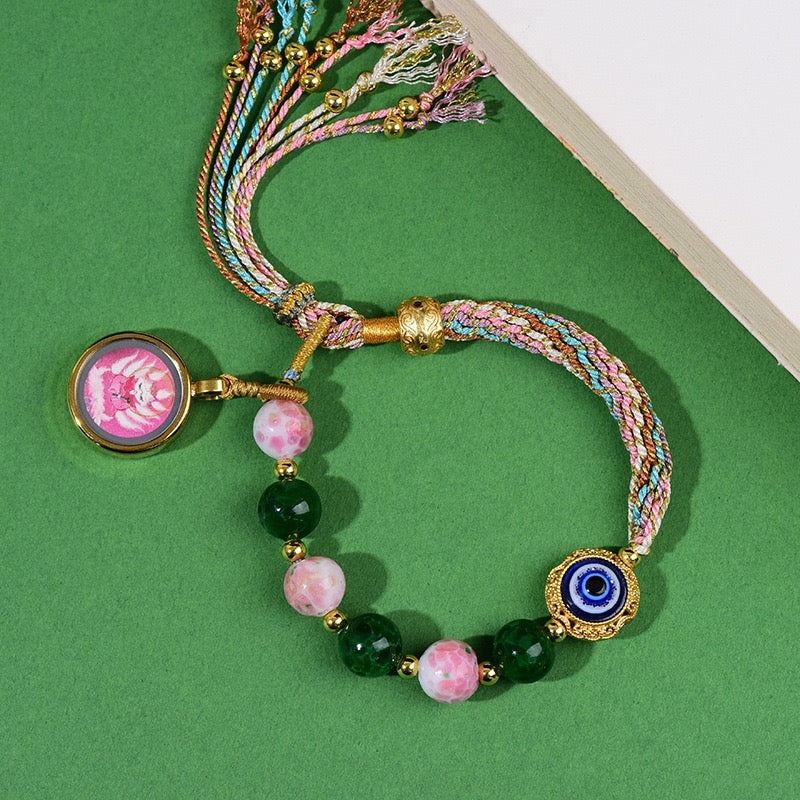 Tibetan Wealth Blessing Bracelet – Handmade Incense-Infused Glass & Thangka Charm